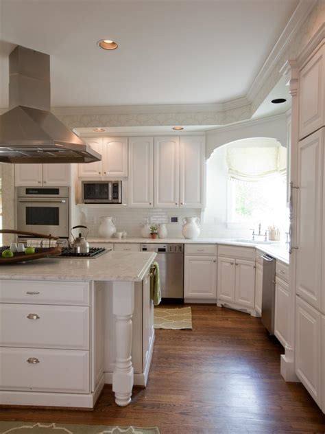 Luxury pine wood beautiful custom kitchen interior design. White Traditional Kitchen with Large Marble Island | HGTV