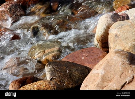 Water Flowing Over Rocks In Stream Stock Photo Alamy