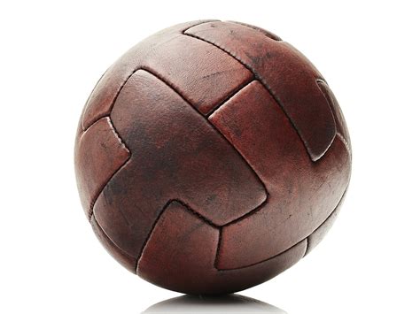 Sport with two opposing teams of nine players who attempt to score points by hitting a ball with a bat and running. Heritage Brown Leather Vintage Soccer Ball | The MVP - MODEST VINTAGE PLAYER LTD