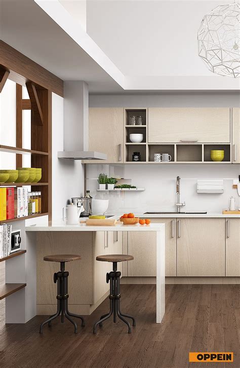To keep 2021 trend in, try painting your kitchen cabinet by bold colors with another neutral or light color for cabinet. Modern Light Wood Grain Kitchen Cabinet | Kitchen style ...