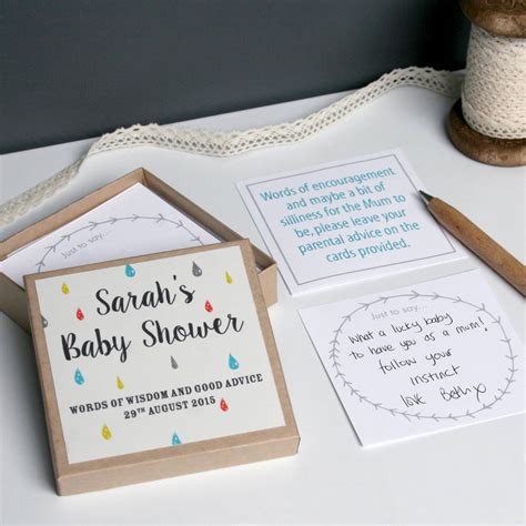 Writing a thoughtful card is one way to share the family's excitement. personalised baby shower message box by modo creative | notonthehighstreet.com