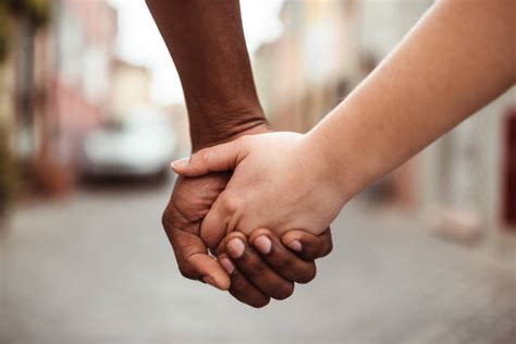Biracial Couple Holding Hands Stock Photos Pictures And Royalty Free
