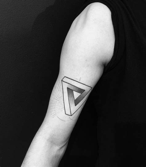 Healed Penrose Triangle Tattoo On The Right Bicep