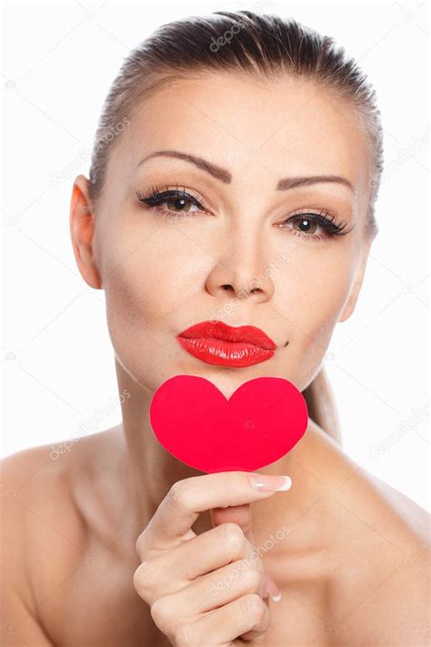 Portrait Of Beautiful Gorgeous Smiling Woman With Glamour Bright Makeup And Red Heart In Hand