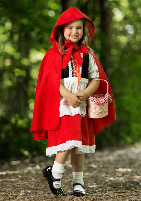 Little red riding hood raised her eyes, and when she saw the sunbeams dancing here and there through the trees, and pretty flowers growing everywhere, she thought: Deluxe Child Little Red Riding Hood Costume