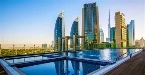 It is decked out in solid gold revolving doors and gold coloured decor throughout. World's Tallest Gevora Hotel In Dubai Offers The Pool With ...