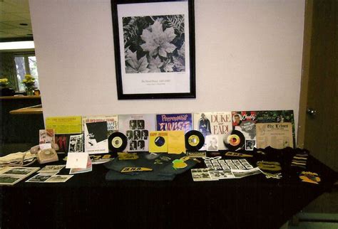 Memorabilia Table With A Rotary Phone Old 45s Albums Etc Reunion