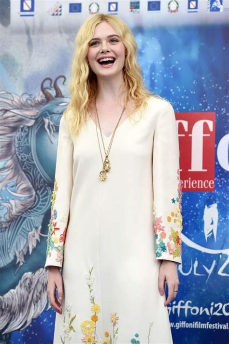 Elle Fanning Looks Drop Dead Gorgeous In This White Floral Dress