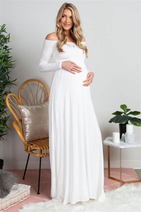 Details A Solid Hued Long Sleeve Tall Maternity Maxi Dress Featuring