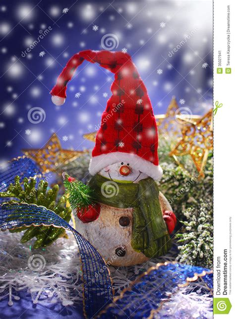 Christmas Decoration With Snowman At Snowy Night Stock