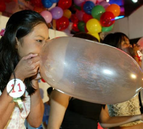 Girls Blowing Up Balloons Telegraph