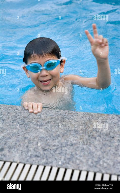 Young Boy At The Pool Stock Photo Alamy