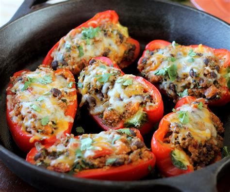 Delicious Baked Peppers Stuffed With Quinoa Black Beans And Cheese