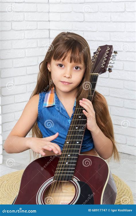 Little Girl Playing The Guitar Stock Image Image Of Person Portrait