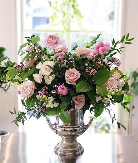 Champagne Bucket Of Pink And Blush Florals Leafandpetalnola Com Flower Arrangements