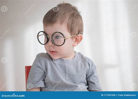 Toddler Preschooler Boy In Glasses With Hand Upback To School Concept