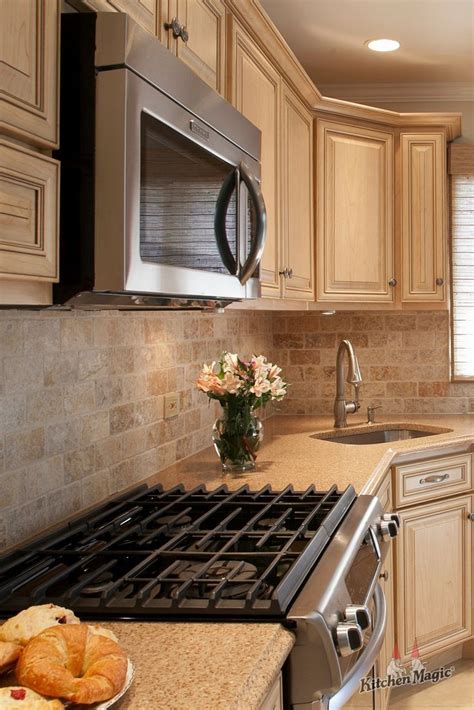Could it be absorbing moisture from the mortar/thin set? Tumbled Marble tile is fantastic for backsplashes! It adds ...