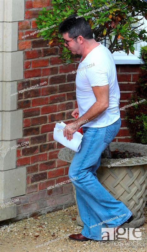 Simon Cowell Arrives To Visit The X Factor Finalists At The House On His 55th Birthday Featuring