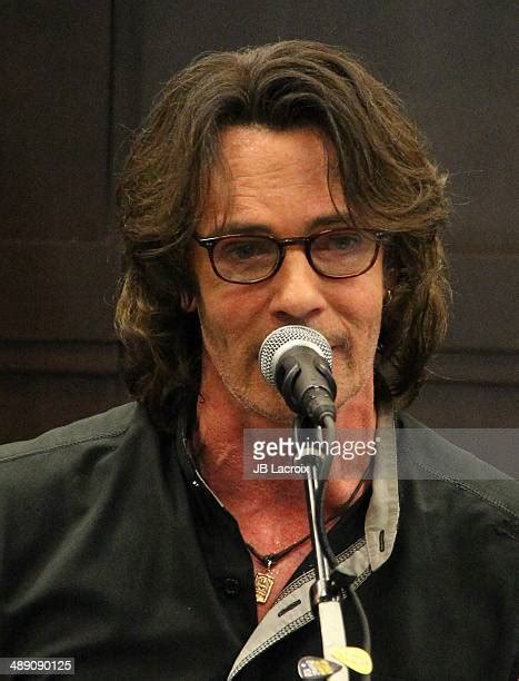 Rick Springfield Signs Copies Of His New Book Magnificent Vibration