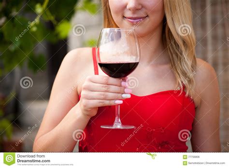 Beautiful Woman Drinks Red Wine Outdoor On A Hot Summer Afternoon Stock