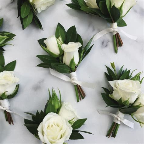 Example Of White Spray Roses In A Boutonniere Could Include One Or Two