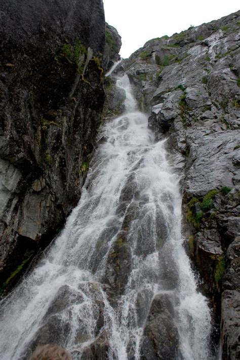 Waterfall On Rock Cliff Face Alaska Stock Image Image Of Mist
