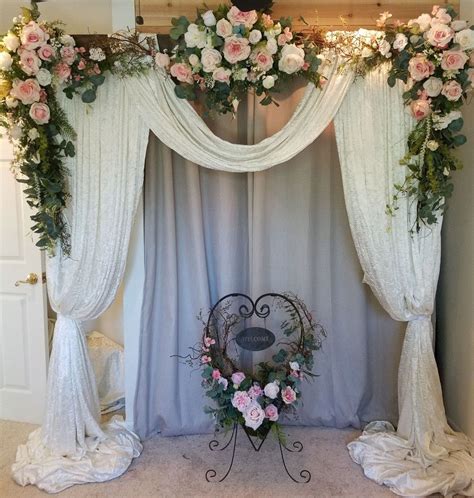 White Blush And Ivory Flower Swags With Drapery And Hanging Crystals To Be