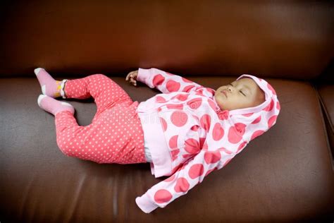 Baby Sleeping On A Sofa Picture Image 8275633