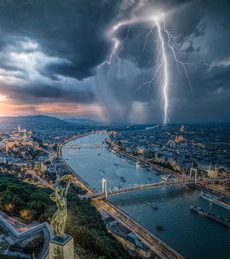 A Lightning Bolt Is Seen Over The City In This Aerial Photo Taken From