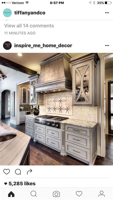 An Instagramted Photo Of A Kitchen With Gray Cabinets