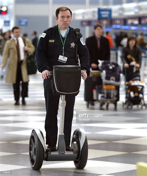 Chicago Police Officer Scott Shaver Rides A Segway Ht Scooter As He