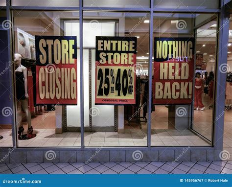 Closing And Clearance Signs At Clothing Stores Editorial Photography