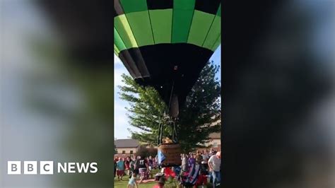 Wayward Hot Air Balloon Crashes Into Crowd Bbc News