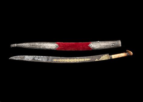 bonhams an ottoman walrus ivory hilted sword yataghan made by ustad nuh turkey dated ah