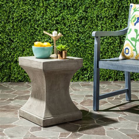 With a textured lattice design, circular silhouette and luxurious natural stain, it&#39;s a magnificent way to add tone, texture and visual interest to your space. Safavieh Curby Outdoor Modern Concrete Accent Table - Dark ...