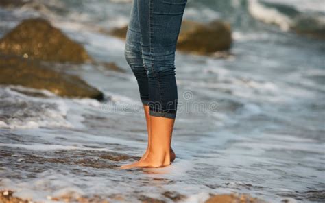Woman Bare Foot Walking On The Beach Between Rocks Stock Image Image