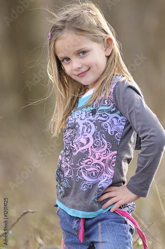 Portrait Of A Cute Little Girl Buy This Stock Photo And Explore