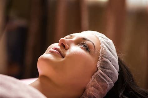 Calm Girl Having Spa Facial Massage In Luxurious Beauty Salon Stock Image Image Of Cosmetology