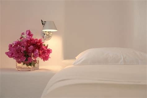 All White Bedroom Decor Flowers By The Bedside Starting