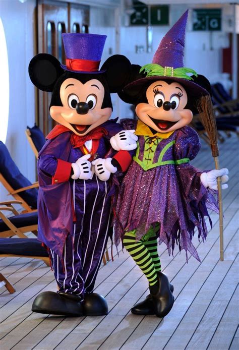 Mickey And Minnie Dressed For Halloween With Images Disney