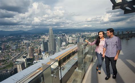 The view of klcc petronas tower from kl tower sky deck. KL Tower Tickets Price 2020 + Online DISCOUNTS & PROMO
