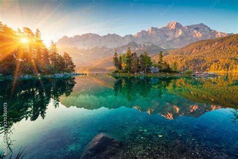 Impressive Summer Sunrise On Eibsee Lake With Zugspitze Mountain Range