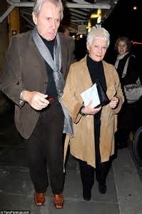 Judi Dench Wraps Up In Camel Coat As She Leaves London Event With Her