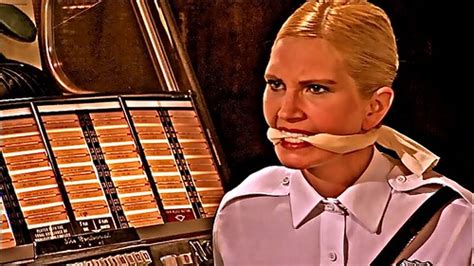 Gagged Blonde Cop Painted Still Frame From Film Nine Muses Nathan