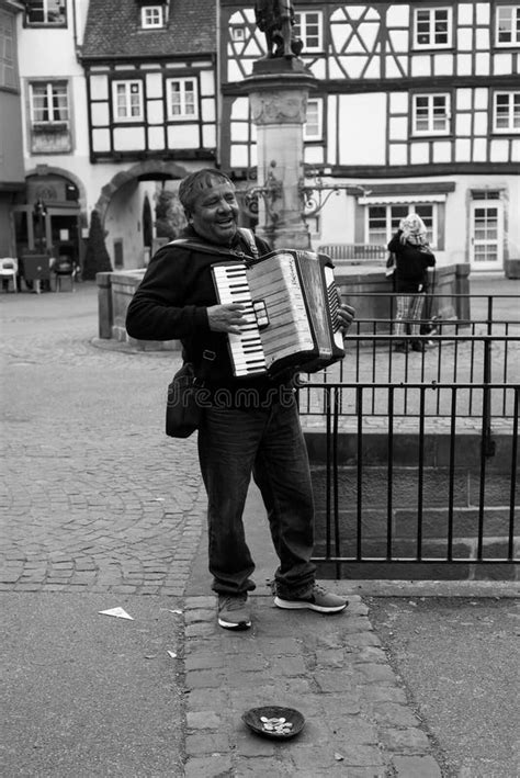 Portrait Of Musician Playing Accordion In The Street Editorial Stock