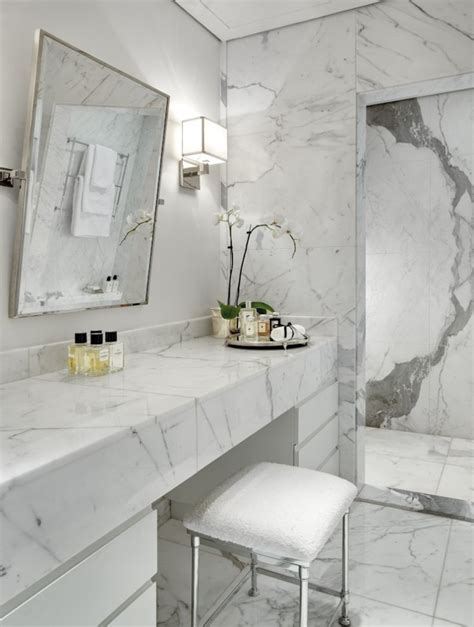 In this bathroom, the entire shower enclosure is marble. 48 Luxurious Marble Bathroom Designs | DigsDigs