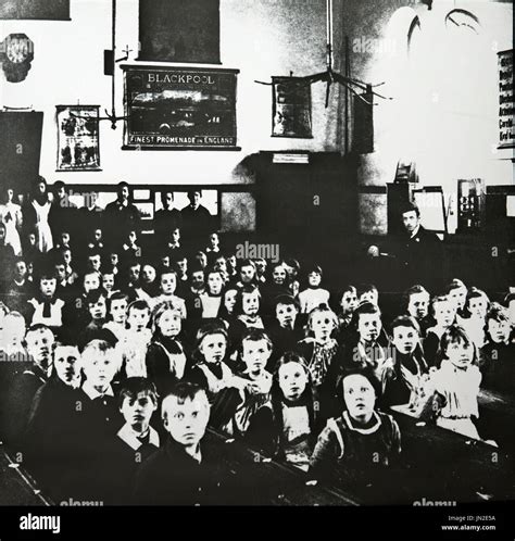Image Of A Classroom Full Of School Children In Victorian England
