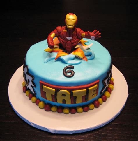 A 21st century child's birthday memories won't be complete without at least one rainbow layer cake in there somewhere. Custom Cakes by Julie: Iron Man Cake
