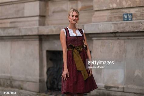 red dirndl photos and premium high res pictures getty images