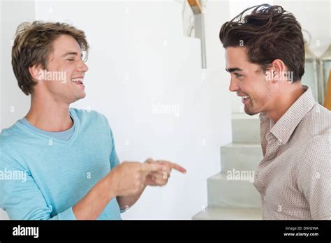 Two Male Friends Talking To Each Other Stock Photo Alamy